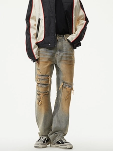 Vintage yellow wash baggy straight jeans with distressed ripped details in street style