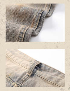 Detailed stitching of waist belt loops and hem folds on vintage yellow wash denim jeans