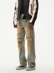 Retro distressed loose fit straight jeans with ripped patches and stripe details