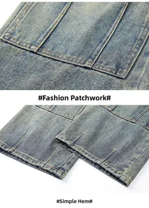 Detail view of denim jeans featuring patchwork pockets and simple cuffs with vintage wash