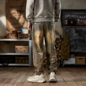 Retro loose straight jeans with vintage yellow wash and white paint splatter for men