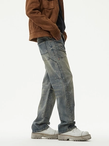 Men's vintage wash blue cargo carpenter jeans in a stylish American retro loose straight fit