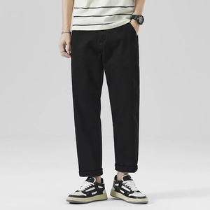 Pantaloni casual neri da uomo dal taglio dritto con risvolto e tessuto elasticizzato