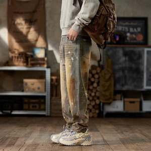 Vintage wash loose straight leg jeans for men with street style paint splatter design