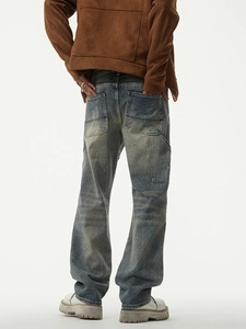 Men's vintage wash loose straight jeans with oversized back pockets in blue street style