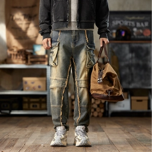 Mens vintage cargo jeans with distressed yellow stitching and multiple utility pockets