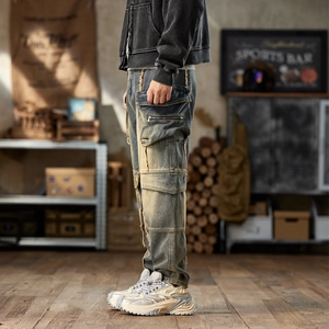 Retro multi-pocket cargo jeans with distressed wash and frayed patchwork details