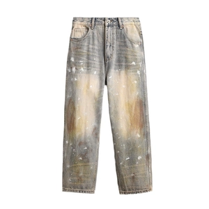 Men's vintage loose straight-leg jeans with yellow mud wash and white paint splatters