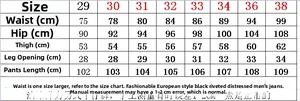 Detailed size chart for men's black distressed stretch denim jeans showing waist and hip data