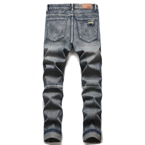 Blaue Herren-Jeans im Retro-Look mit Distressed-Details und Leder-Patch am Bund hinten