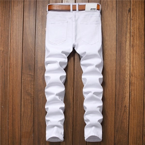 Men's slim-fit white cotton denim jeans with back pockets and brown leather belt detail