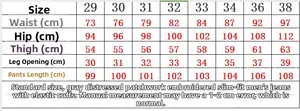 Detailed size chart for gray washed ripped slim fit stretch skinny men's denim jeans