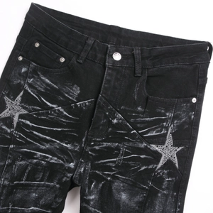 Slim fit black flare jeans for men with rhinestone star patchwork and distressed wash