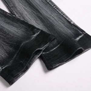 Slim fit flared black washed denim jeans for men with vintage distressed texture