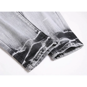 Men's high street grey denim jeans with vintage gradient wash and distressed hem details