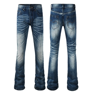 Detailed view of men's flared jeans featuring vintage wash cat whiskers and M-shaped back pockets