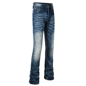 Detailed close-up of dark blue flare jeans featuring vintage whiskers and faded denim texture
