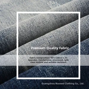 Detail of blue denim fabric made of 98% cotton and 2% spandex with twill texture