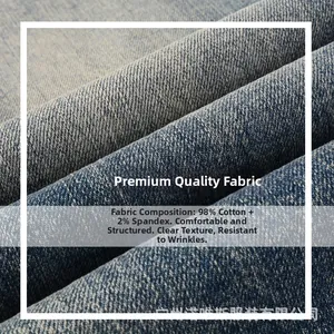 Detail of blue denim fabric with 98% cotton and 2% spandex texture and soft twill weave