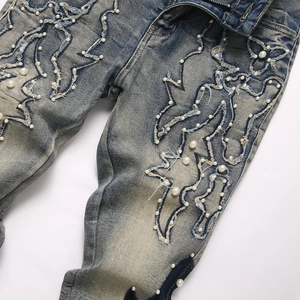 Jean évasé bleu slim fit de style high street avec broderies perles et trous usés