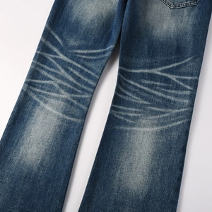 Tall men's slim fit flared blue jeans featuring whisker wash detail on high-quality denim