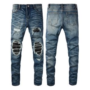 Slim fit ripped patch denim jeans in deep blue with heavy wash and vintage details
