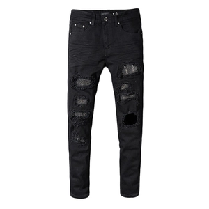 Men's high street distressed black denim jeans with sparkling rhinestone embellishments