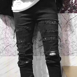 Men's slim-fit washed black distressed jeans featuring rhinestone-embellished ripped details