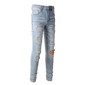 Jean slim bleu clair pour homme avec déchirures, mesh et strass scintillants