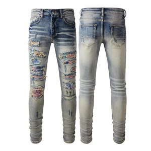 Jeans Skinny da Uomo Strappati Distressed Pantaloni in Denim Streetwear Con Patch Colorate Vita Media Slim Fit Pantaloni da Uomo Fashion Casual