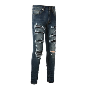 Men's slim fit distressed blue jeans with stylish striped patches and ripped details