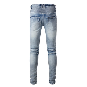 Jean moto homme bleu clair avec empiècements plissés et coupe ajustée vue de dos