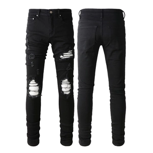 Men's slim fit black ripped denim jeans with distressed moto street style details