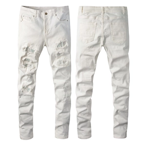 Men's slim fit white ripped jeans with silver sequin lining and distressed details