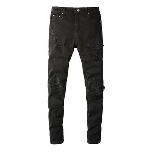 High street slim fit black distressed jeans with ribbed patches and knee holes