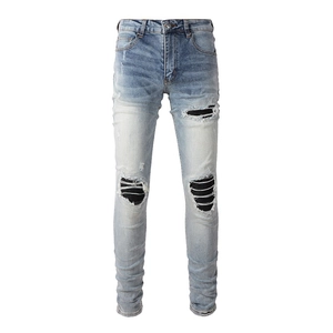 Men's slim-fit light blue distressed jeans with black ribbed PU leather patches