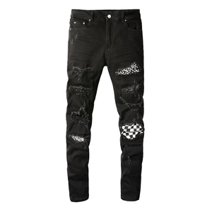 Men's slim fit black distressed jeans with checkerboard patch and bone prints