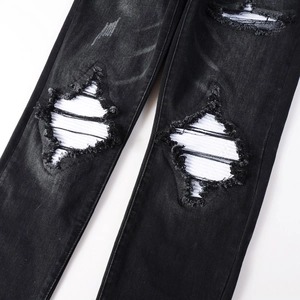 Men's American retro washed black distressed jeans with frayed knee hole details