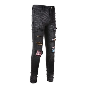 Slim fit men's distressed jeans with digital patch patterns and stylish ripped details