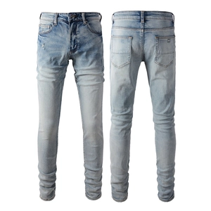 Men's slim fit stretch light blue denim jeans with vintage washed faded details