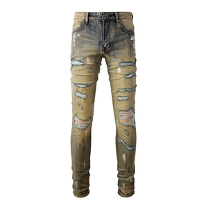 Herren Slim Fit Jeans im Retro-Look mit Distressed-Rissen und bunten Farbspritzern