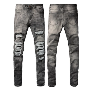 Vue avant et arrière du jean gris déchiré pour homme avec style denim délavé et vintage