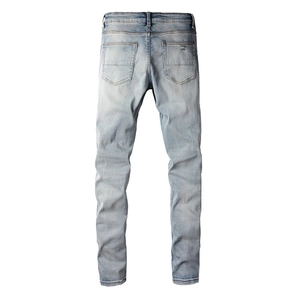 Men's slim fit stretch light blue jeans with distressed back pockets and street style