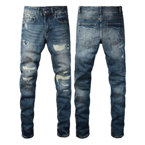 Men's slim fit ripped denim jeans in dark blue wash with professional distressed details