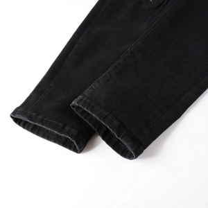 Men's stylish black slim fit distressed denim jeans with high-quality hem stitching detail