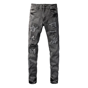 Men's retro slim fit distressed grey jeans with paisley patchwork and ripped detailing