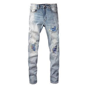 Jean bleu clair slim avec empiècements colorés et détails déchirés pour hommes