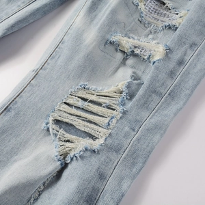 Men's American vintage light blue distressed jeans with rhinestone detailing and rip effects