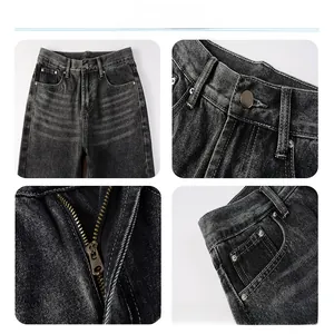 Detail view of washed black flare jeans showing metal button, zipper and premium stitching