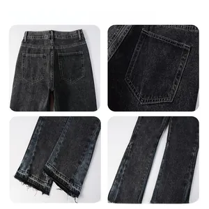 Detail of dark grey washed denim with raw edges and contrast patchwork stitching